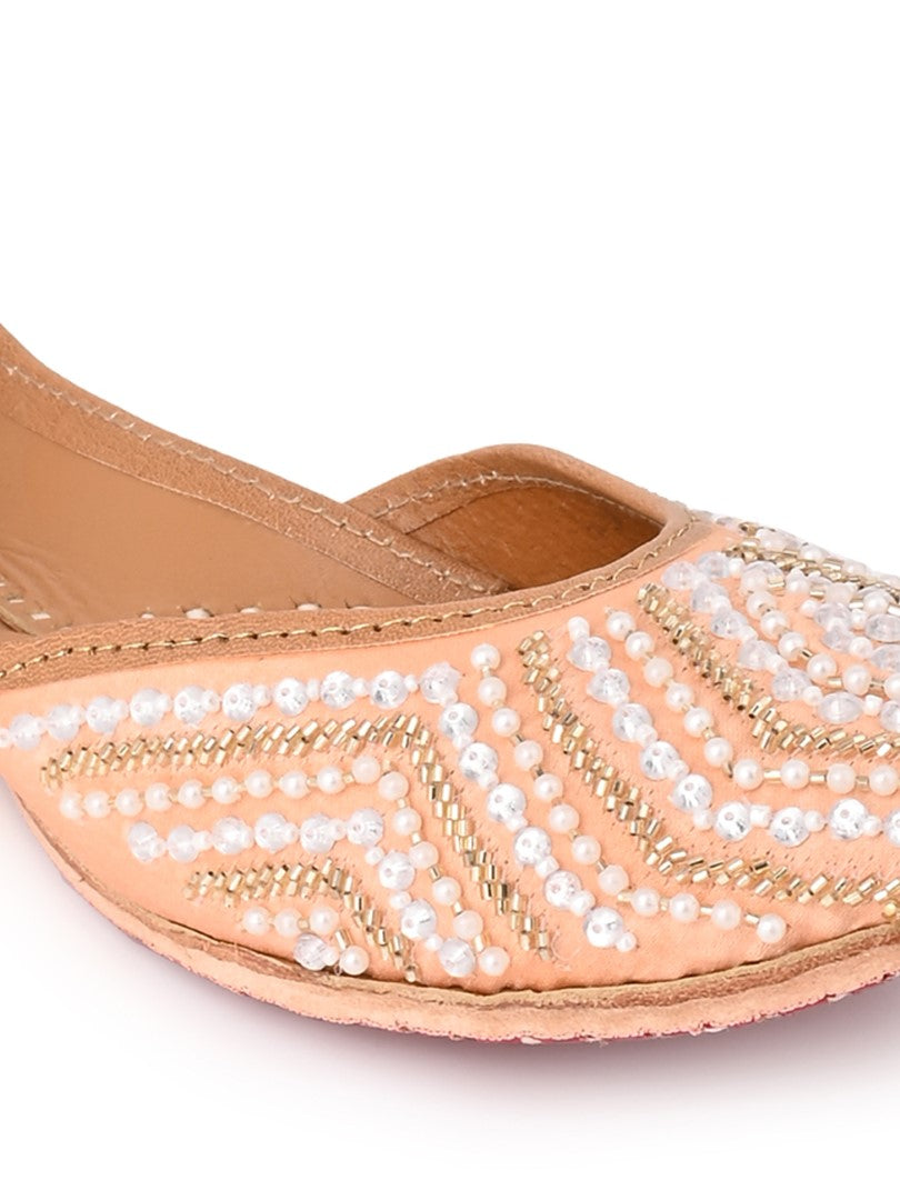 Hand embroidered peach jutti
